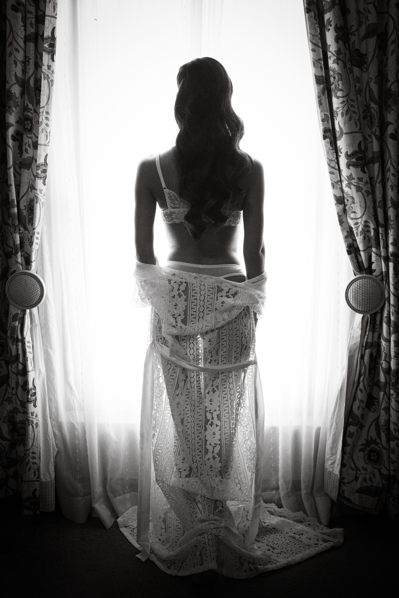 Bride silhouette by window