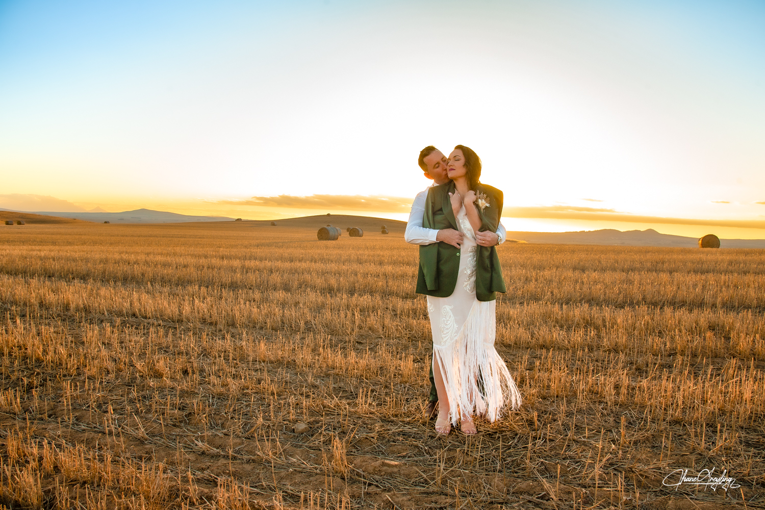 Marle and Michael wheat field sunset